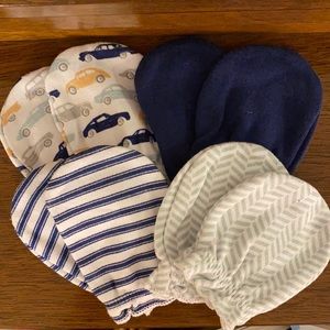 Baby mittens, four pair. Never used.